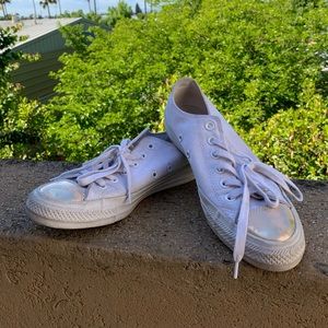 White converse with gold accents